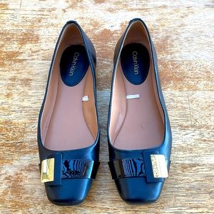 Calvin Klein, black leather flats, size 7. $15